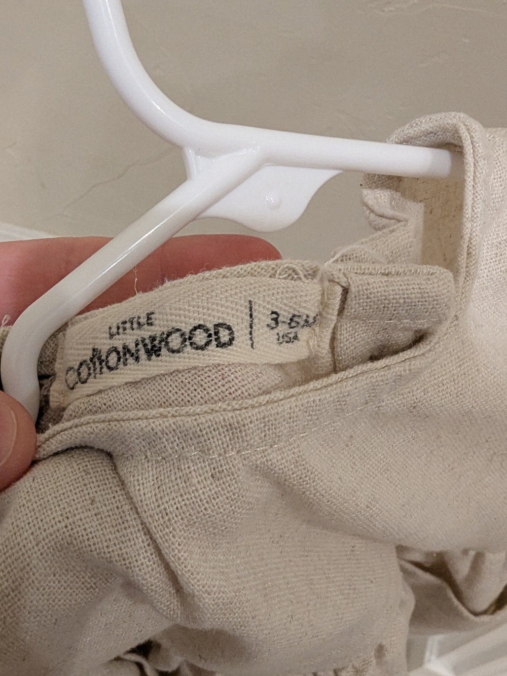 Little Cottonwood | Neutral Linen-Look Baby Dress with Pockets - Picture 2 of 2